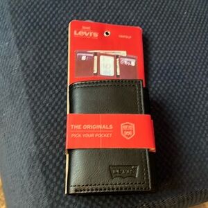 Levi’s men’s wallet. New in package